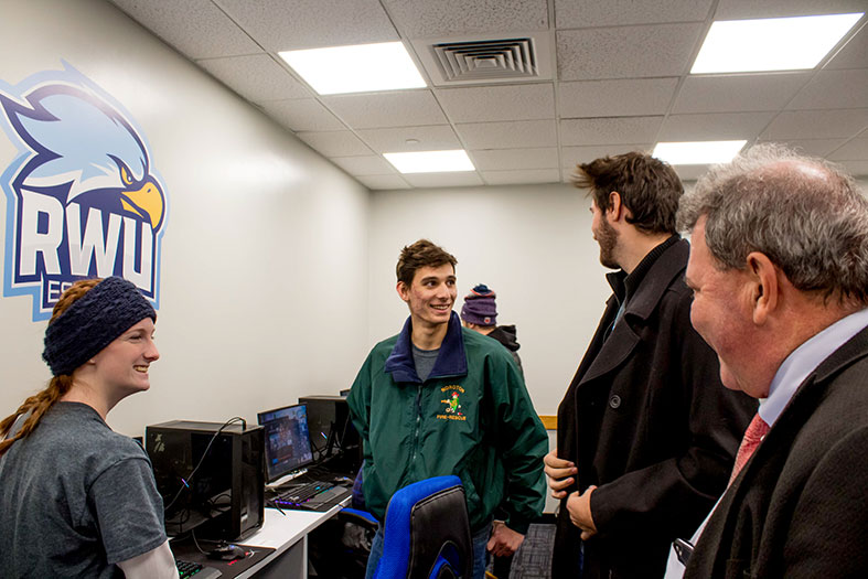 Students tour RWU's new esports facility.