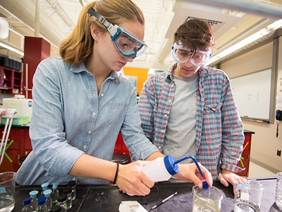 Two students working in a science laboratory 