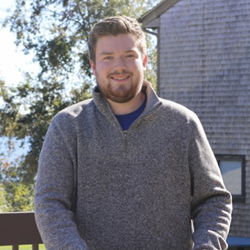 A photo of student Sean Nugent standing outside 