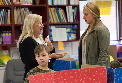 RWU professor talks with RWU student