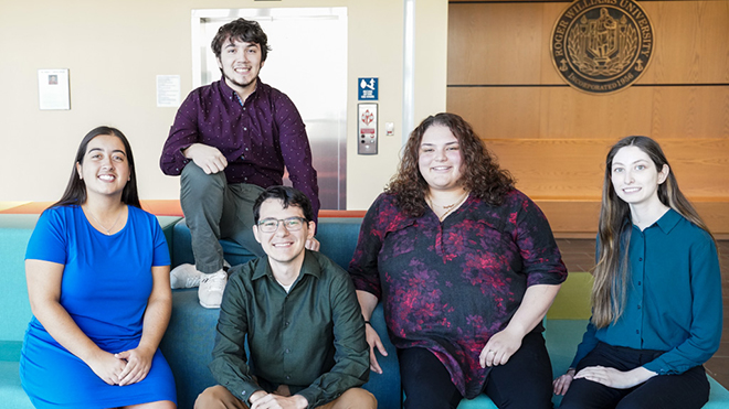 A group of students sitting in SECCM 