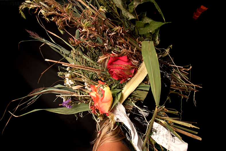 Sculputure made of flower and weeds