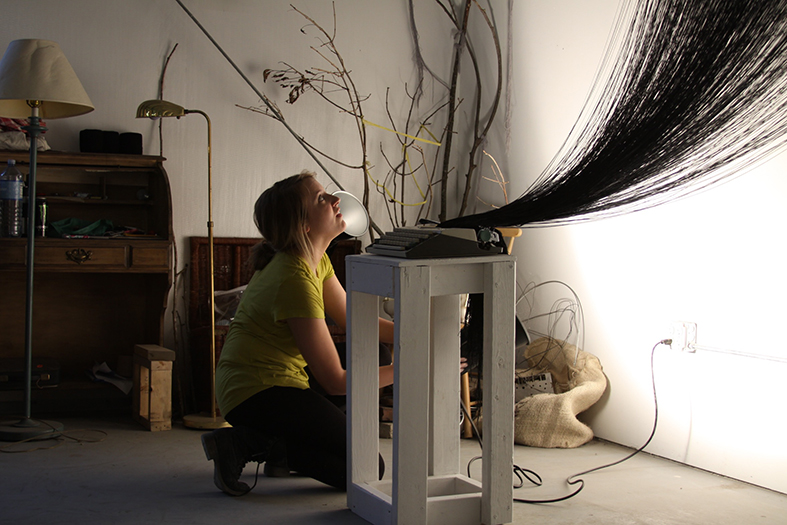 Student working on an art installation