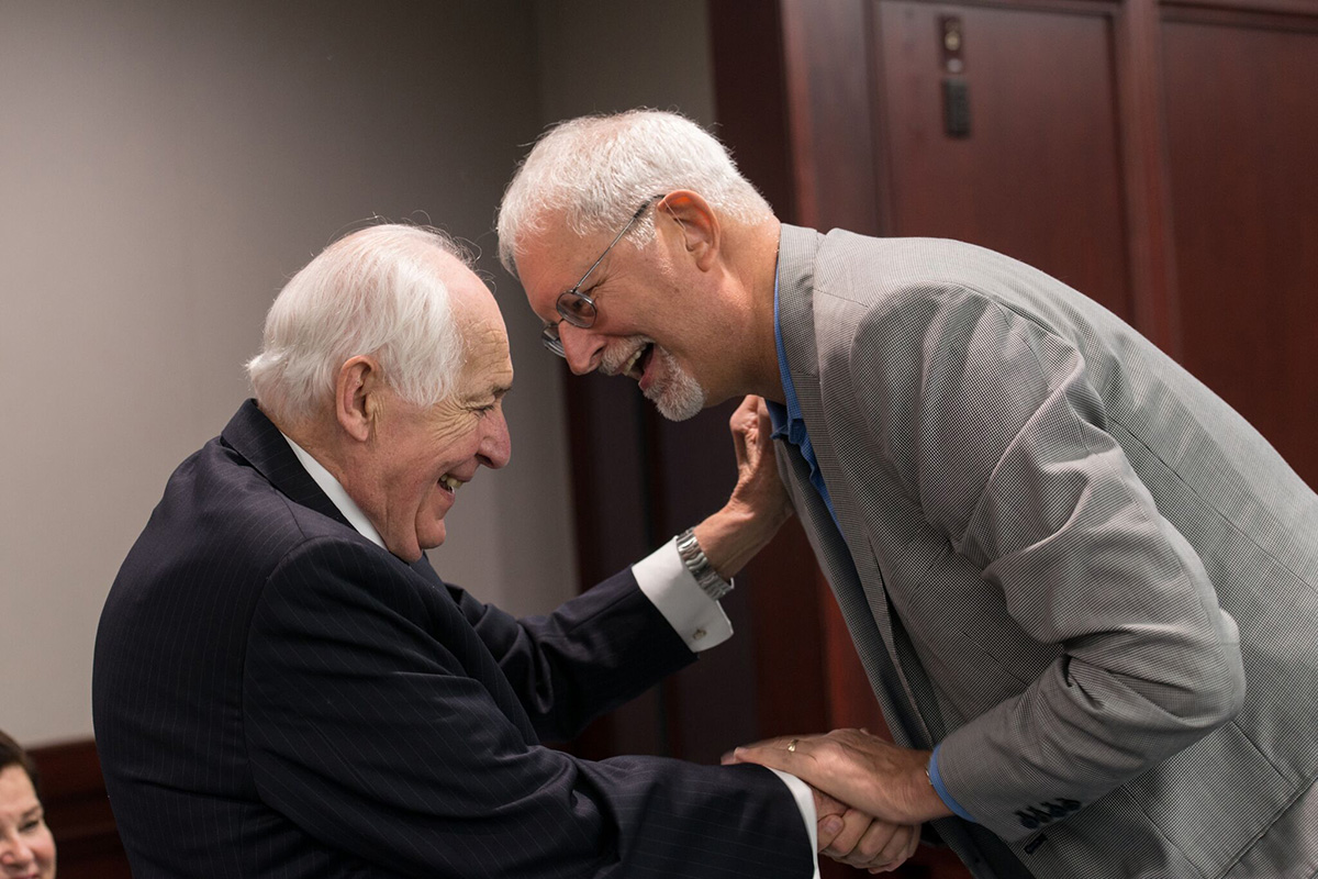 Former Dean David Logan greets Judge Selya