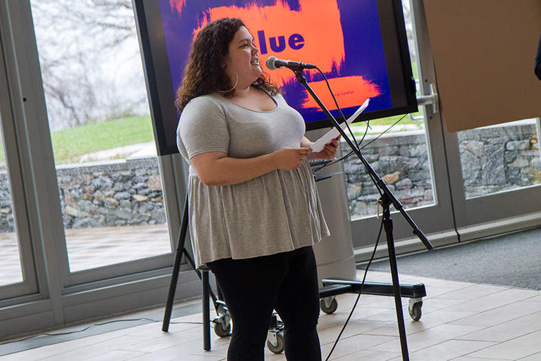 Lucy Lawlor reading a poem.