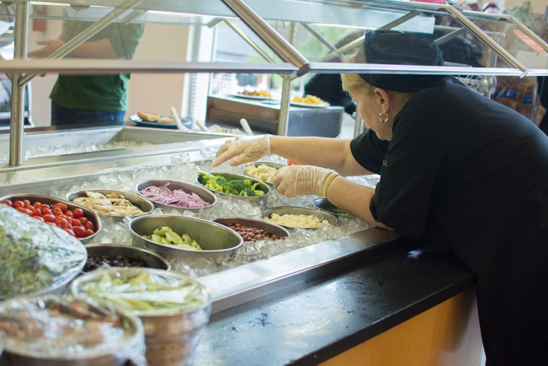 Salad bar being stocked