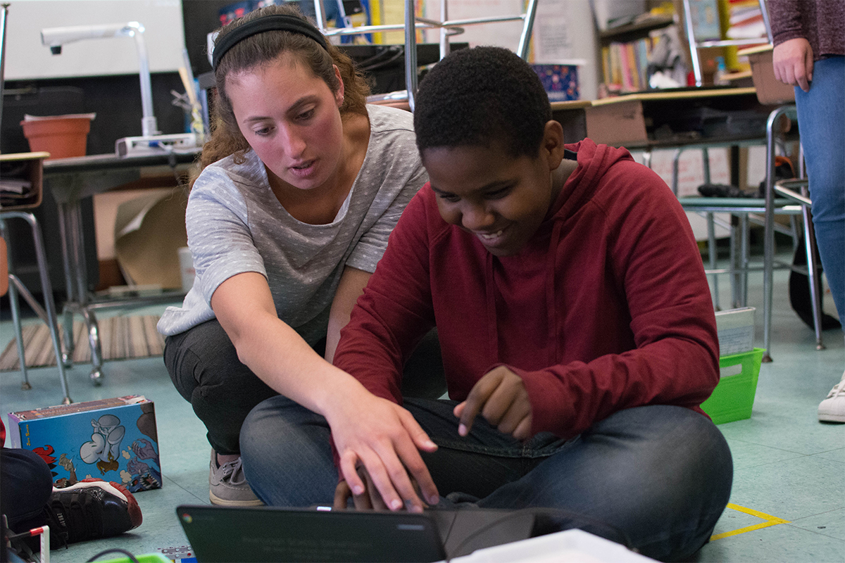 RWU Students works with male student