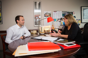 student talking with faculty