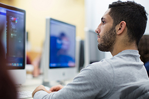 student working at a computer