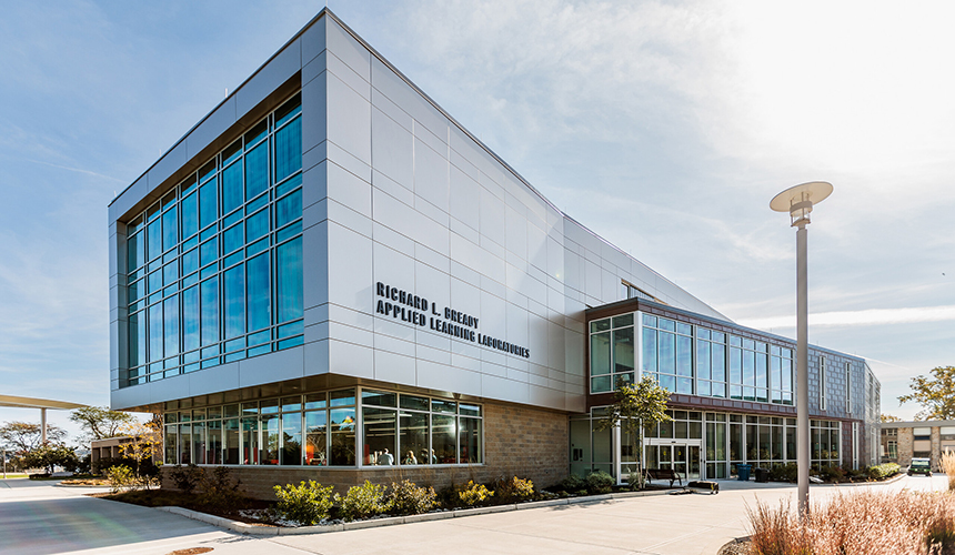 aerial image of  the Richard L. Bready Applied Learning Laboratories building with Mount Hope bridge in background