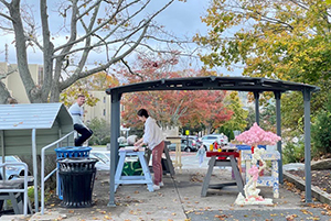 Image of students working in RWU's outdoor sculpture yard