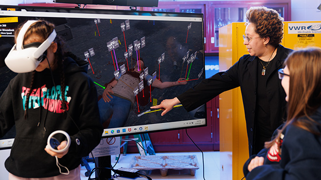 image of Prof Marriott teaching as a student uses the VR program