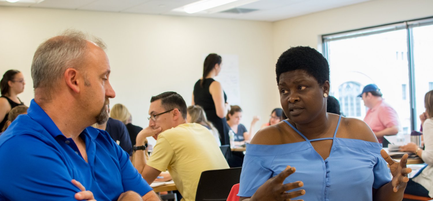 Two UC students in class