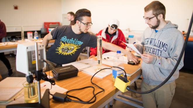 Students work in fluid lab