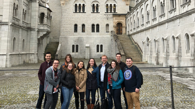 Students abroad in front of buildings