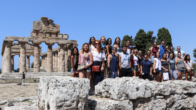 Students abroad in front of buildings