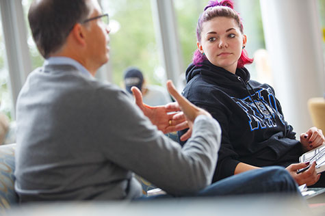 Student listening to a professor.