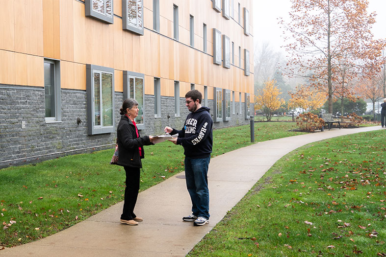 Student conducts voter exit poll on Election Day.