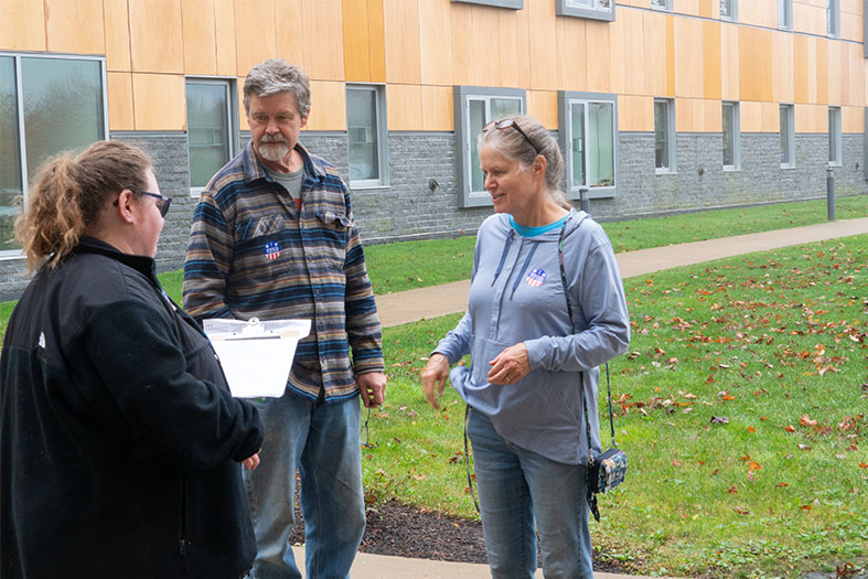 Student conducts voter exit poll on Election Day.