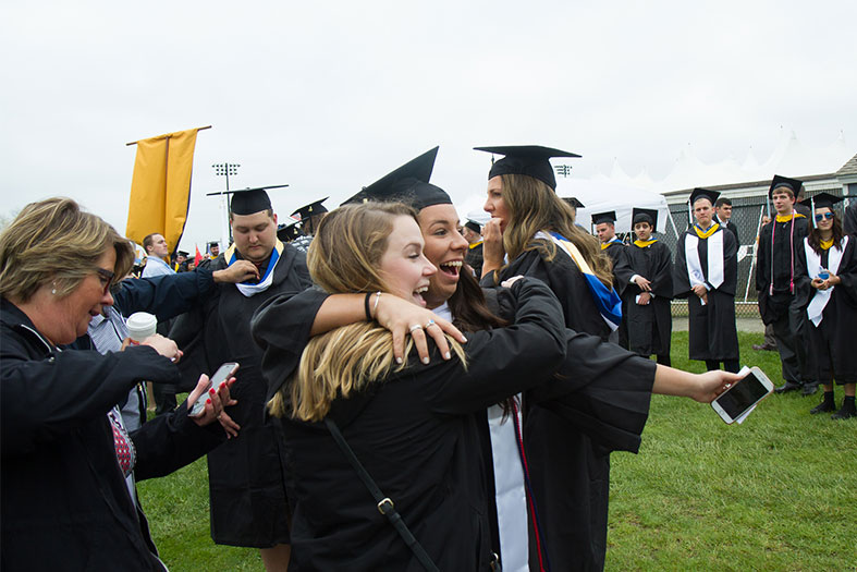 Graduates celebrate at Commencement.