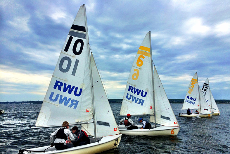 RWU sailing team practicing on the campus waterfront.