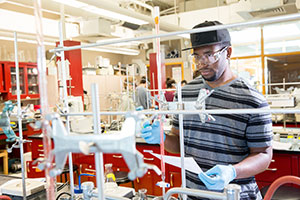 Student works in chemistry lab.