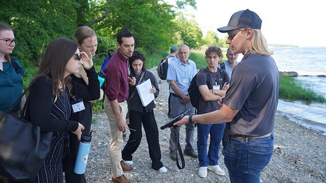 Michael Rock of Jaia Robotics demonstrates the company’s innovative autonomous aquatic drones to conference attendees in a live demonstration.