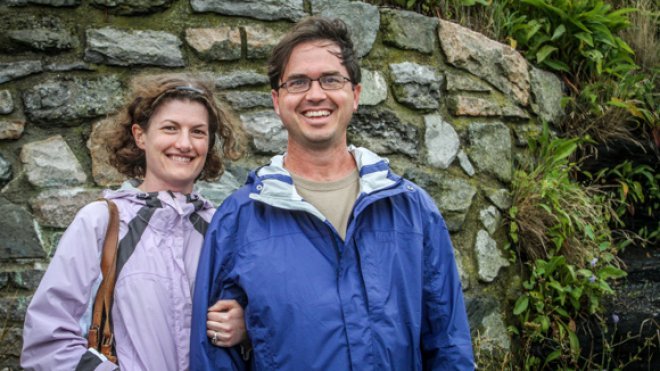 Professor and his wife pose together