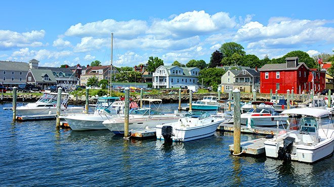 Boats docked at harbor.