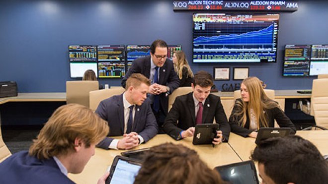 Students working in the portfolio management program.