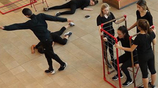 Students practice their dance