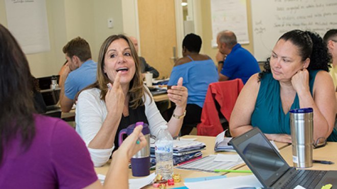 ESL teachers at table in RWU