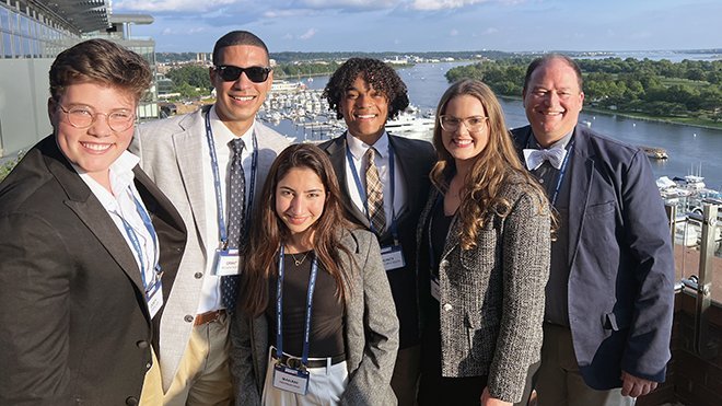 Professor Joseph Roberts and five RWU students pose for a photo in Washington, D.C.