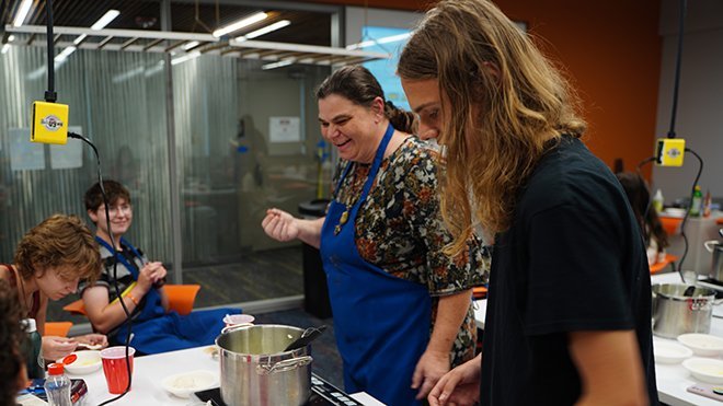 Jennifer Pearce, Associate Professor of Physics, with three students at the Food Science Camp