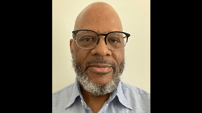 A headshot of Kelvin Purvis