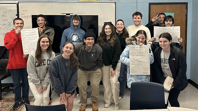 RWU Public Relations majors with students at Mt. Hope High School in Bristol