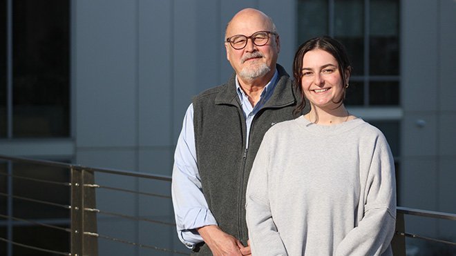 Communication Studies Professor Robert Cole and Morgan Felice, a senior Psychology major with a minor in Criminal Justice standing outside GHH