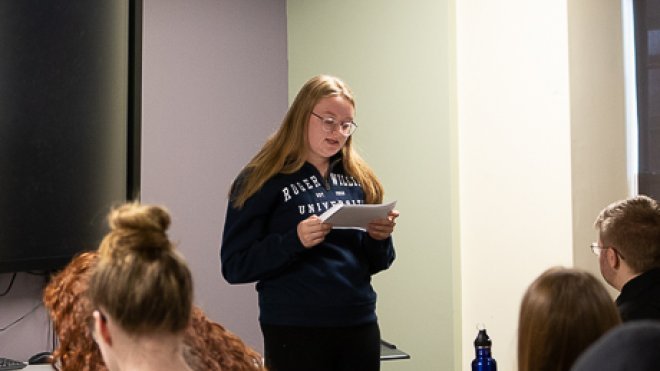 Students makes speech.