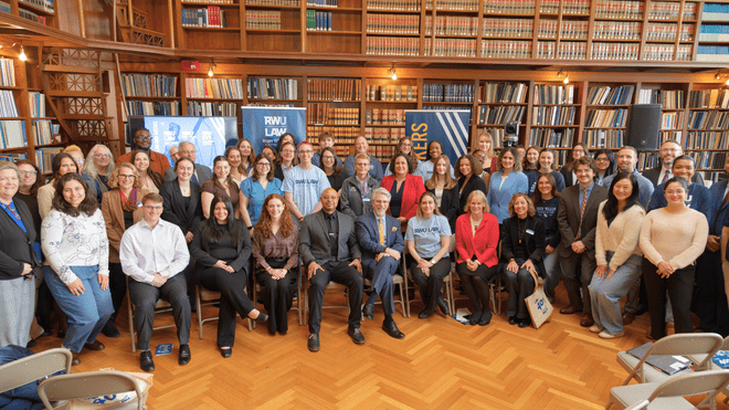 Members of the RWU community and state leaders gather in the Rhode Island State Library during RWU Day of Law and Justice.