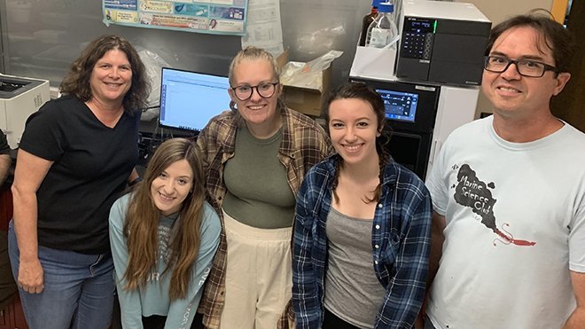 Professors and undergraduate researchers work on groundbreaking cyanide detection research recently published in a leading scientific journal.