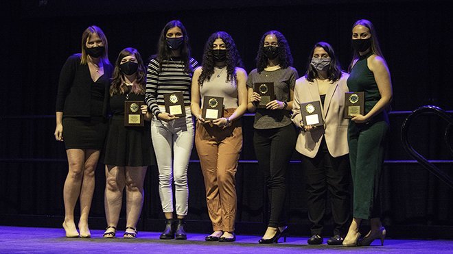 Students pose with awards 