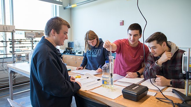 Students work on an experiment.