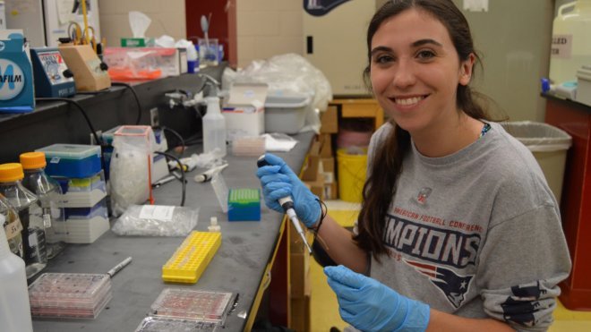 Student conducts research in science ab