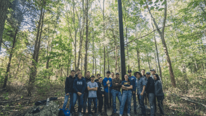 Group photo in the woods. 