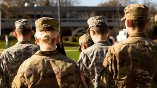 RWU ROTC cadets stand at attention during the ceremony.