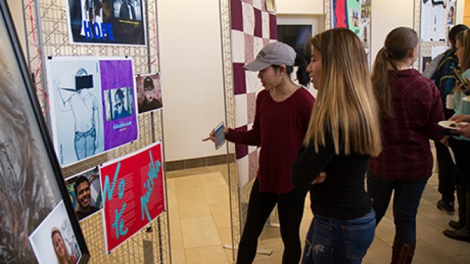 Students looking at a gallery