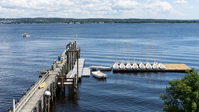 Dock with boats tied up.