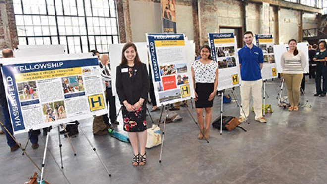 Students presenting posters about their community-engaged work.