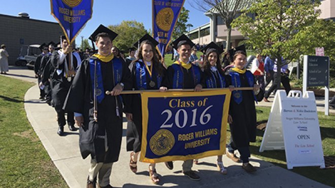 Graduates process to commencement exercises.