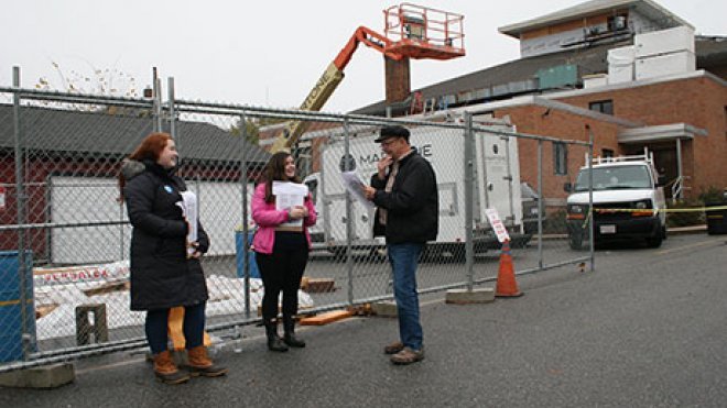 Students conduct voter exit polls on Election Day.